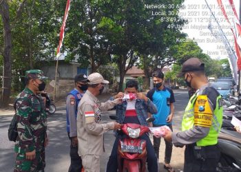 Cegah Penyebaran Virus, Polsek Bululawang Gelar Operasi Masker
