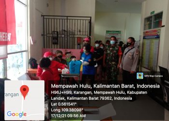 TNI POLRI Mempawah Hulu kawal giat Vaksinasi Dipuskesmas Karangan.