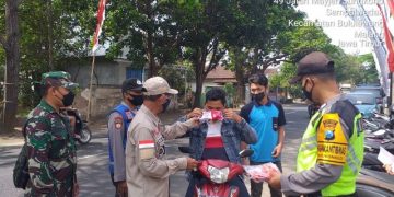 Cegah Penyebaran Virus, Polsek Bululawang Gelar Operasi Masker